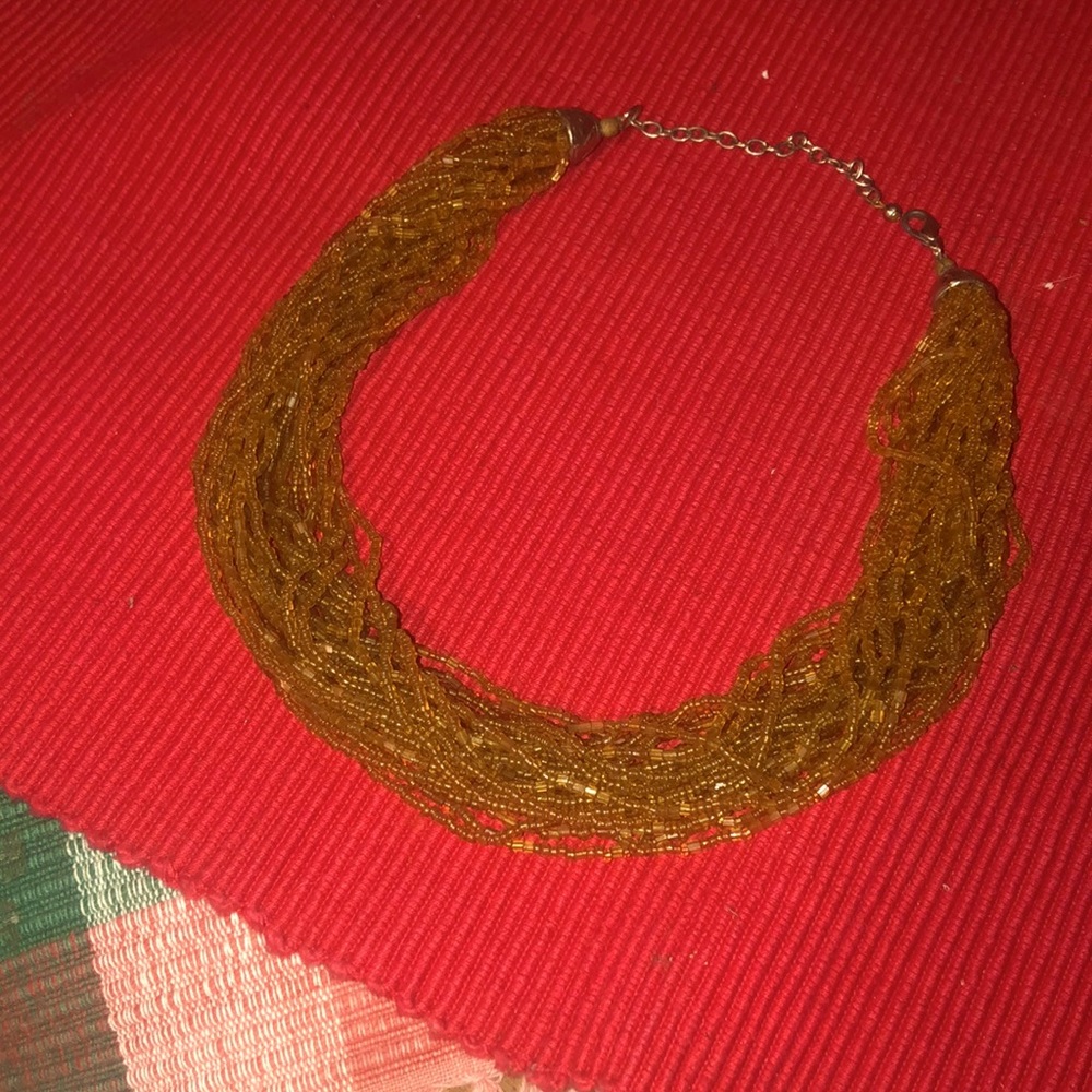 Boho looking Gold seed bead multi strand necklace